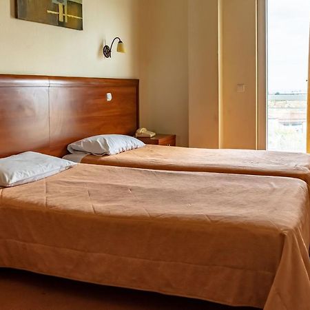 Telis Hotel Aigio Bagian luar foto