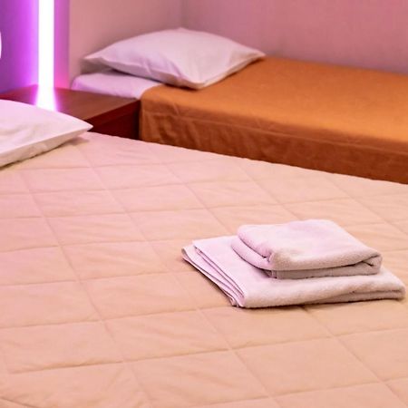 Telis Hotel Aigio Bagian luar foto