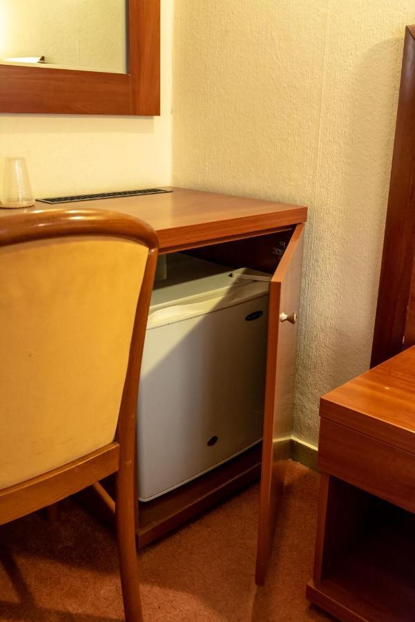 Telis Hotel Aigio Bagian luar foto